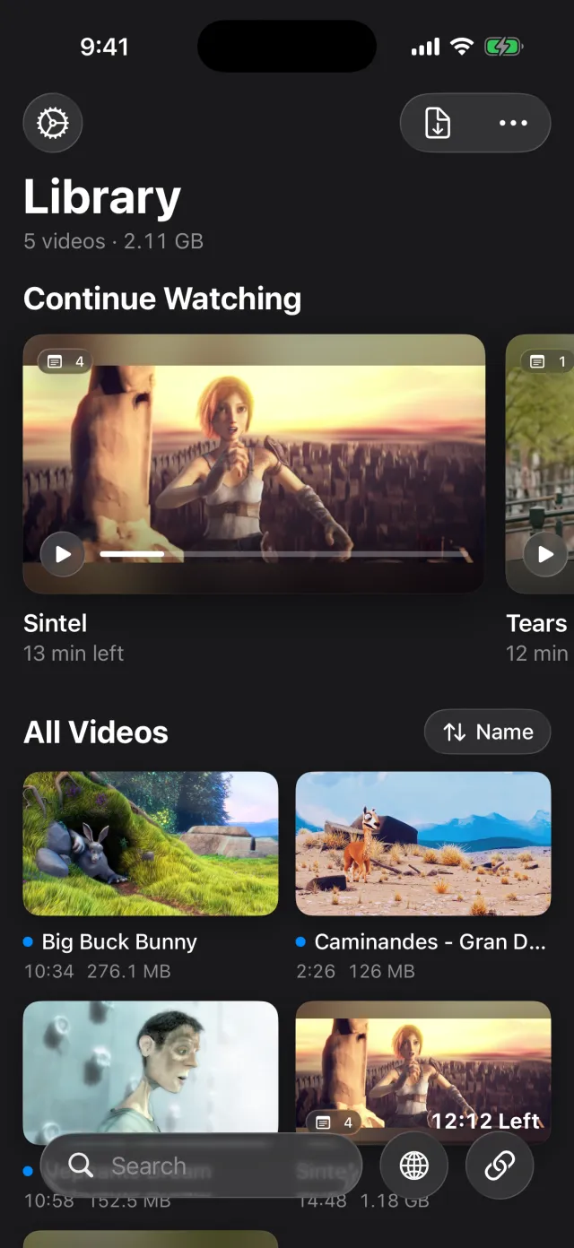 The SuperWatcher library with Continue Watching at the top and a grid of films below.